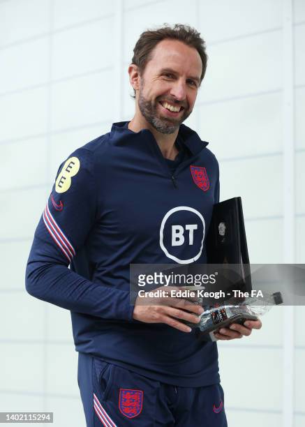 Gareth Southgate, Head Coach of England reacts during an England Training Camp at St Georges Park on June 10, 2022 in Burton-upon-Trent, England.