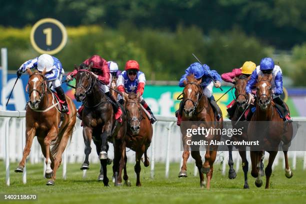 Silvestre De Sousa riding Dance In The Grass win The Chasemore Farm British EBF Maiden Stakes at Sandown Park on June 10, 2022 in Esher, England.