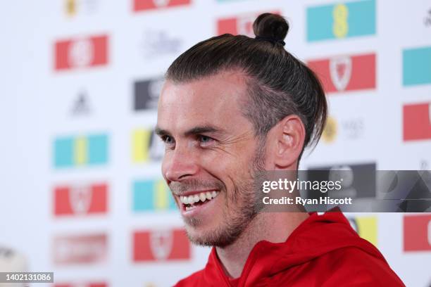 Gareth Bale of Wales reacts during a press conference at The Vale Resort on June 10, 2022 in Vale of Glamorgan, Wales. Wales will play Belgium in a...