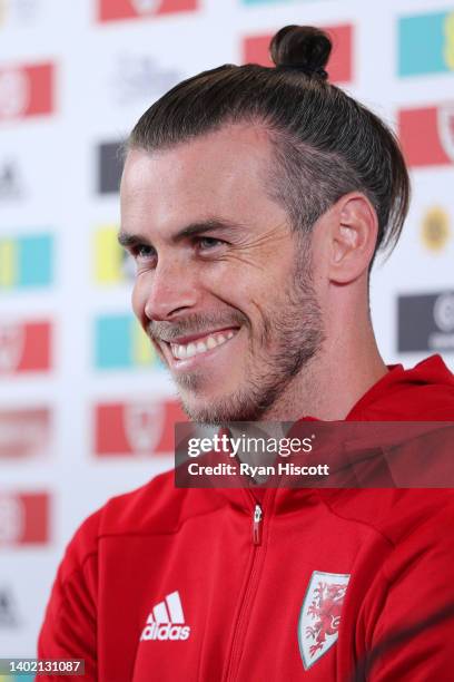 Gareth Bale of Wales reacts during a press conference at The Vale Resort on June 10, 2022 in Vale of Glamorgan, Wales. Wales will play Belgium in a...