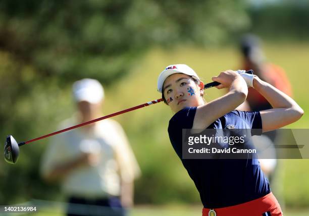 Rose Zhang of The United States Team plays her tee shot on the fifth hole in her match with Emilia Migliaccio against Louise Duncan and Charlotte...