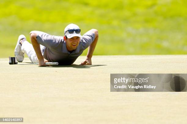Martin Trainer of the United States lines up a putt on the 12th green during the second round of the RBC Canadian Open at St. George's Golf and...