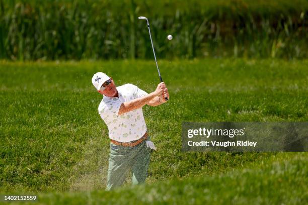 Points of the United States plays his shot from the bunker on the 13th hole during the second round of the RBC Canadian Open at St. George's Golf and...