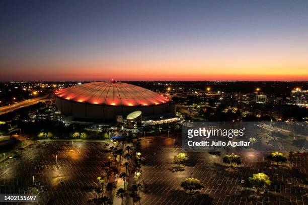 Aerial view of the Tropicana Field lighted up orange after the Tampa Bay Rays defeated the New York Yankees 3-1 on May 28, 2022 in St Petersburg,...
