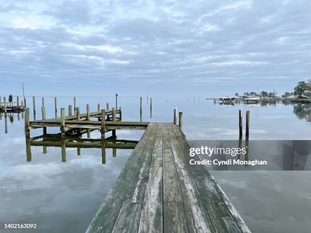 view from a pier of the water off tilghman island. weekend getaway. - tilghman stock pictures, royalty-free photos & images