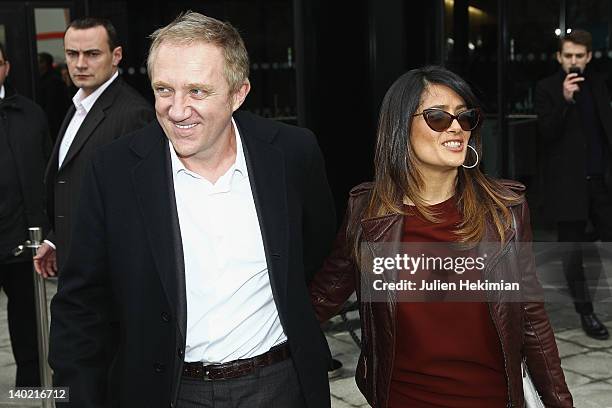 Francois-Henri Pinault and his wife Salma Hayek leave the Balenciaga Ready-To-Wear Fall/Winter 2012 show as part of Paris Fashion Week on March 1,...