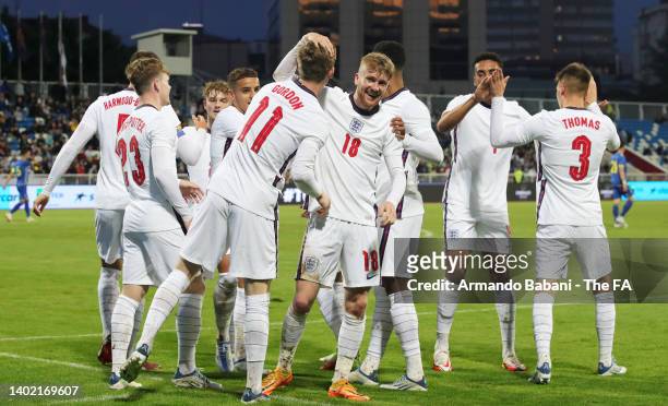 Anthony Gordon of England celebrates with team mates after scoring their side's second goal during the UEFA European Under-21 Championship Qualifier...