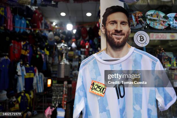 Cardboard cut out of Argentine footballer Lionel Messi is used to display an Argentine national team jersey for the price of 2500 Argentine pesos at...