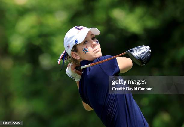 Rachel Heck of The United States Team plays her tee shot on the 16th hole in her match with Rachel Kuehn against Hannah Darling and Annabell Fuller...