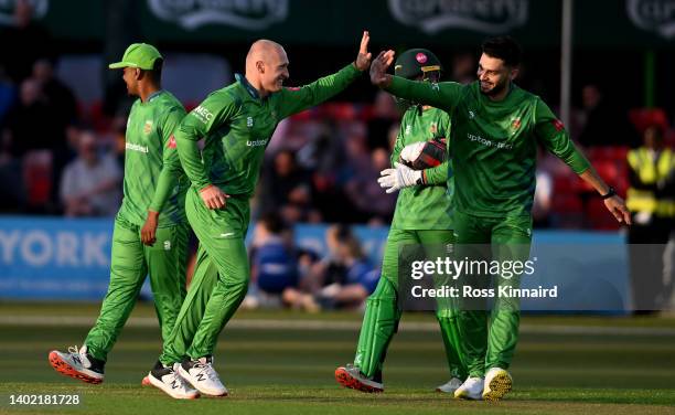 Callum Parkinson of Leicestershire celebrates after taking the wicket of Steve Mullaney of Notts during the Leicestershire Foxes and Notts Outlaws...