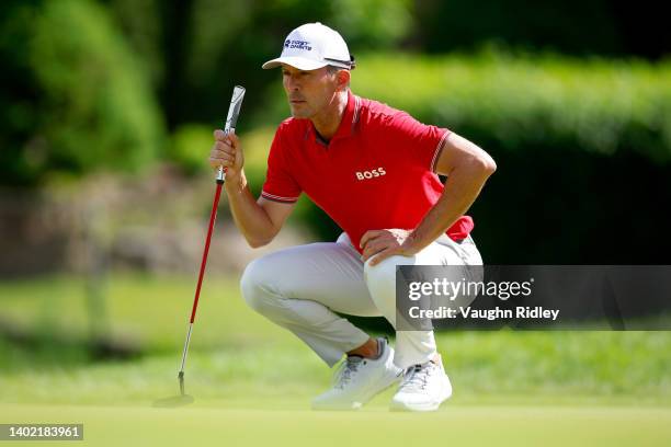 Mike Weir of Canada lines up a putt on the 12th green during the second round of the RBC Canadian Open at St. George's Golf and Country Club on June...
