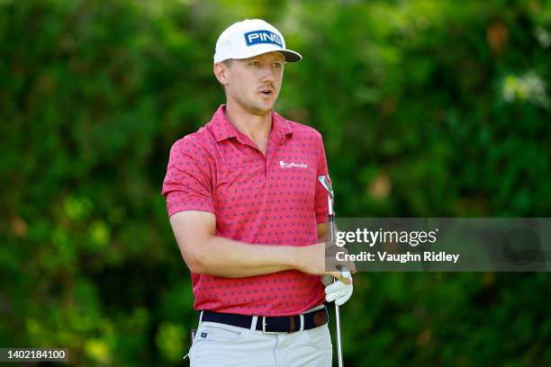 Mackenzie Hughes of Canada follows his shot from the 13th tee during the second round of the RBC Canadian Open at St. George's Golf and Country Club...