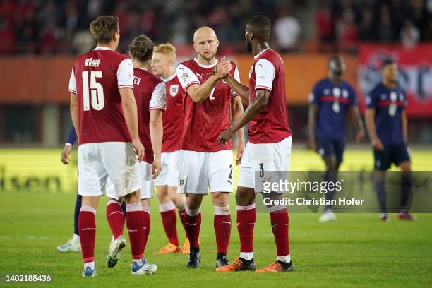 Maximilian Woeber, Gernot Trauner and Kevin Danso of Austria interact following their draw in the UEFA Nations League - League A Group 1 match...