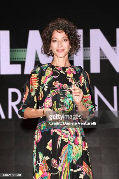 Nicole Grimaudo is awarded on stage during Filming Italy 2022 on June 10, 2022 in Santa Margherita di Pula, Italy.