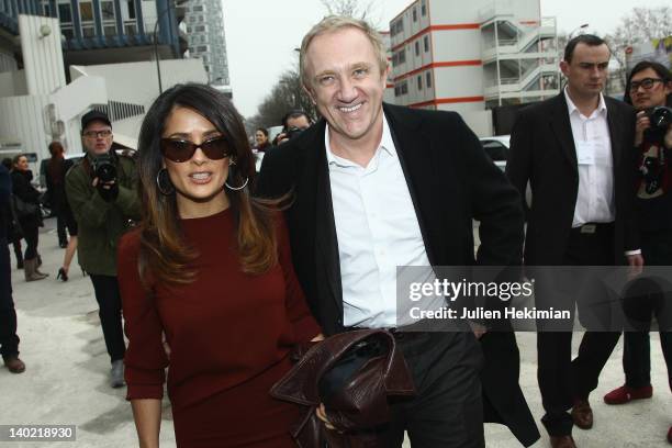 Francois-Henri Pinault and his wife Salma Hayek leave the Balenciaga Ready-To-Wear Fall/Winter 2012 show as part of Paris Fashion Week on March 1,...