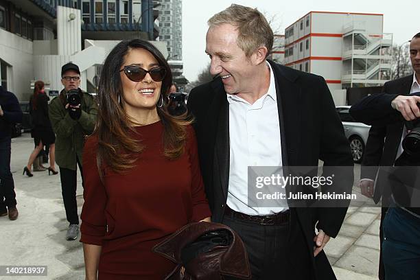 Francois-Henri Pinault and his wife Salma Hayek leave the Balenciaga Ready-To-Wear Fall/Winter 2012 show as part of Paris Fashion Week on March 1,...