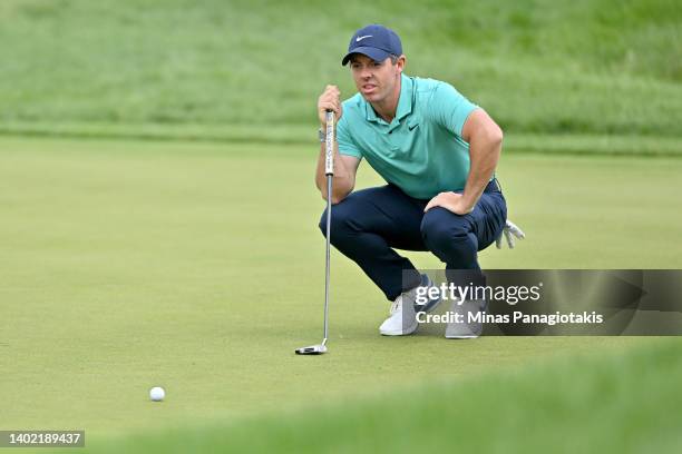 Rory McIlroy of Northern Ireland lines up a putt on the ninth green during the second round of the RBC Canadian Open at St. George's Golf and Country...