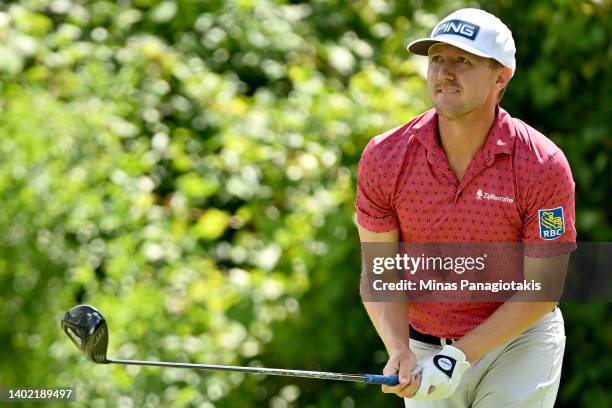 Mackenzie Hughes of Canada follows his shot from the ninth tee during the second round of the RBC Canadian Open at St. George's Golf and Country Club...