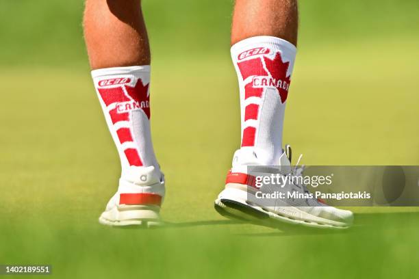Detail view of the socks worn by a caddie during the second round of the RBC Canadian Open at St. George's Golf and Country Club on June 10, 2022 in...