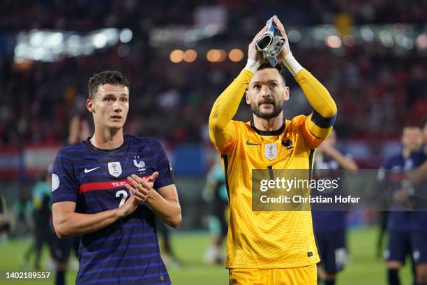 Benjamin Pavard and Hugo Lloris of France applaud the fans following their draw in the UEFA Nations League - League A Group 1 match between Austria...