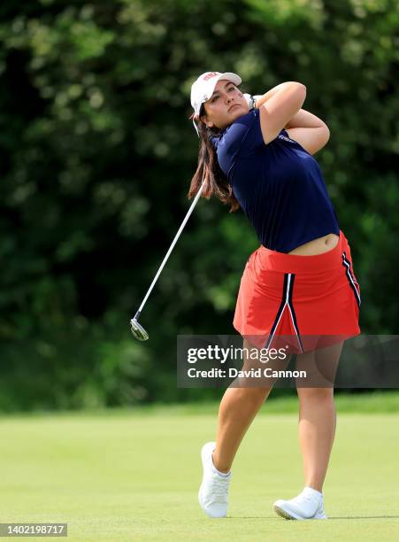 Latanna Stone of The United States Team plays her tee shot on the 11th hole in her match with Jensen Castle against Caley McGinty and Emily Price of...