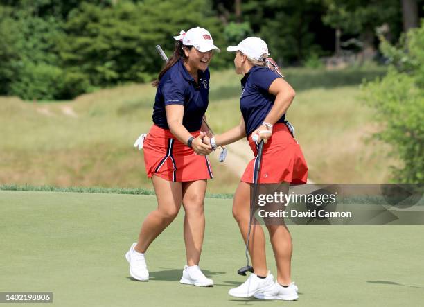 Jensen Castle of The United States Team plays makes a birdie on the eighth hole in their match with Latanna Stone against Hannah Darling and Louise...