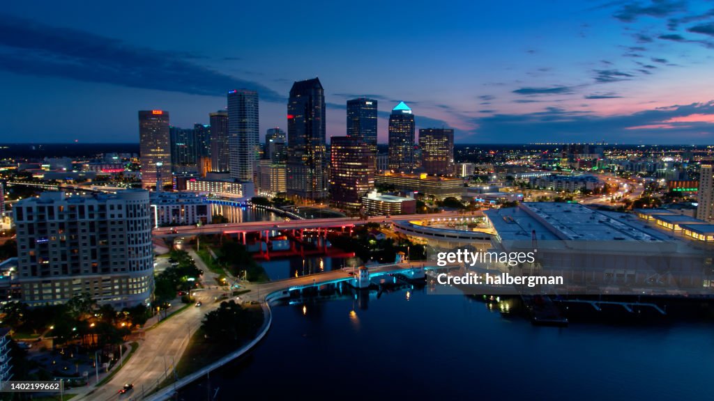 Drone Shot of Sun Rising Behind Downtown Buildings in Tampa, Florida