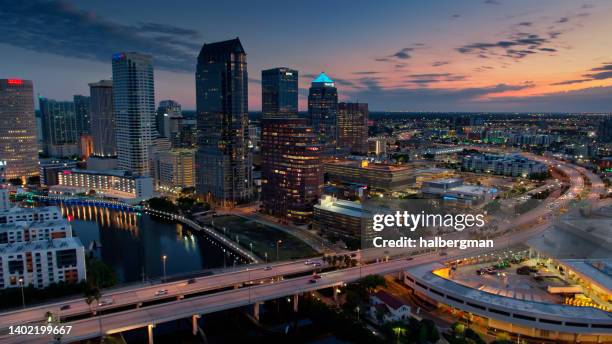 aerial shot of downtown buildings and freeways in tampa, florida - tampa stock pictures, royalty-free photos & images