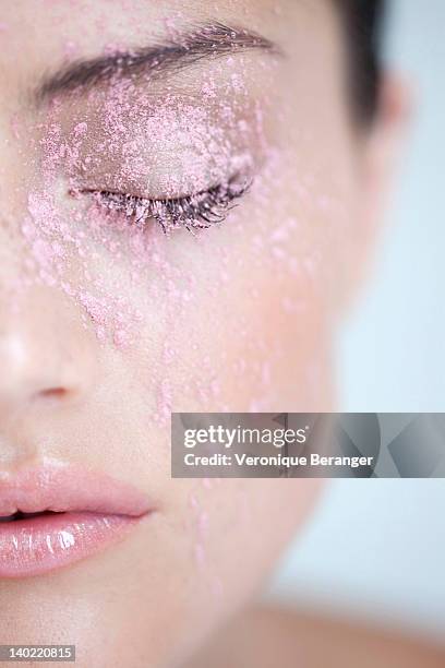 pink powder on woman's face - rouge stock-fotos und bilder