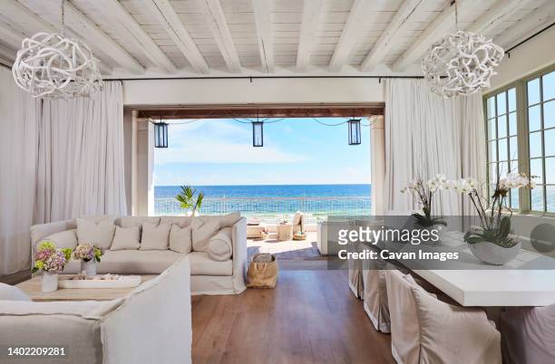 overall living room & dining room with view - waterfront dining stock pictures, royalty-free photos & images