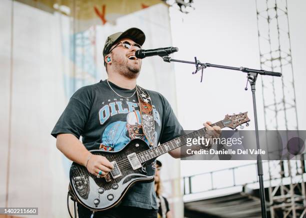 Mitchell Tenpenny performs onstage during day 2 of CMA Fest 2022 at Chevy Riverfront Stage on June 10, 2022 in Nashville, Tennessee.