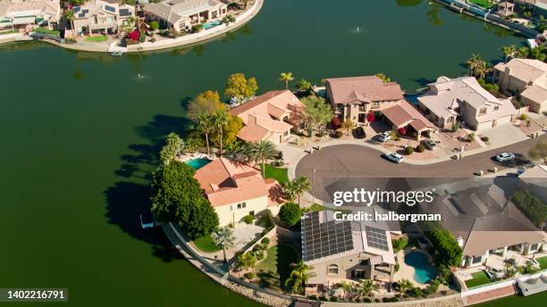 cul-de-sac on artificial lake in glendale, az - aerial - glendale arizona stock pictures, royalty-free photos & images