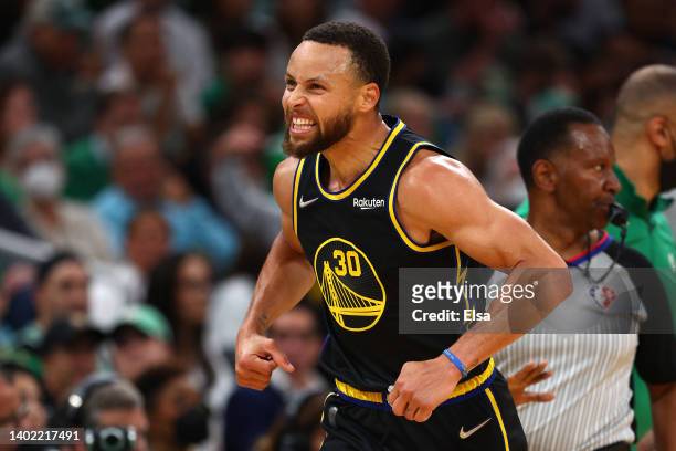 Stephen Curry of the Golden State Warriors celebrates a basket in the first quarter against the Boston Celtics during Game Four of the 2022 NBA...