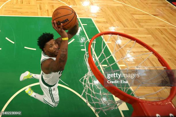Marcus Smart of the Boston Celtics drives to the basket against the Golden State Warriors in the second half during Game Four of the 2022 NBA Finals...