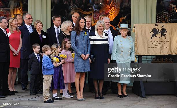 Catherine, Duchess Of Cambridge and Camilla Duchess Of Cornwall and Queen Elizabeth II visit the department store Fortnum & Mason on March 1, 2012 in...