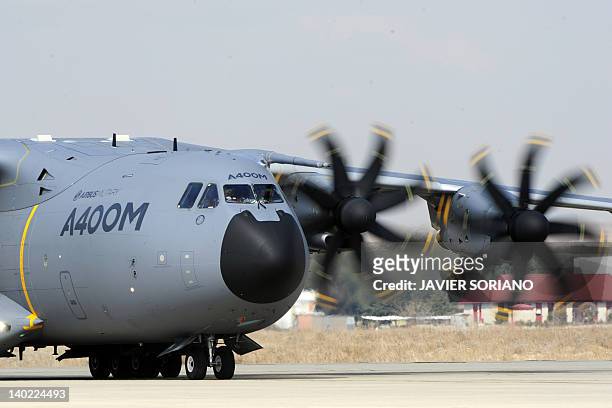 An Airbus 400A military airplane lands after a test flight with Spain's King Juan Carlos aboard at Torrejon de Ardoz military airbase near Madrid on...