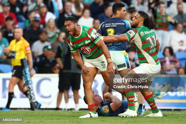 Taane Milne of the Rabbitohs celebrates a try during the round 14 NRL match between the Gold Coast Titans and the South Sydney Rabbitohs at Cbus...