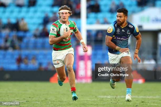 Campbell Graham of the Rabbitohs runs the ball during the round 14 NRL match between the Gold Coast Titans and the South Sydney Rabbitohs at Cbus...