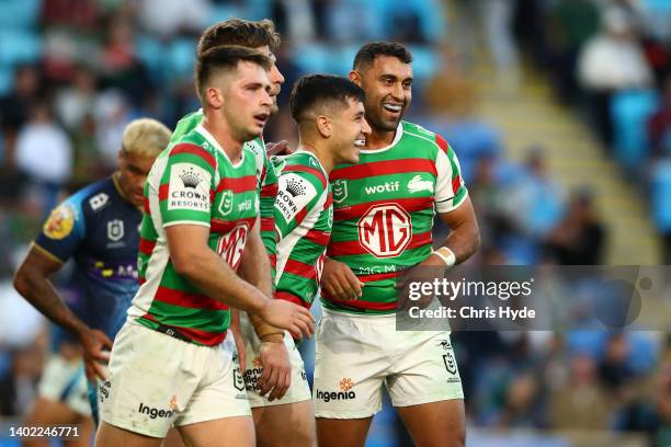 Alex Johnston of the Rabbitohs celebrates a try during the round 14 NRL match between the Gold Coast Titans and the South Sydney Rabbitohs at Cbus...