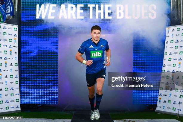 Beauden Barrett of the Blues leads his team onto the field during the Super Rugby Pacific Semi Final match between the Blues and the Brumbies at Eden...