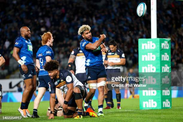 Hoskins Sotutu of the Blues celebrates after scoring a try during the Super Rugby Pacific Semi Final match between the Blues and the Brumbies at Eden...