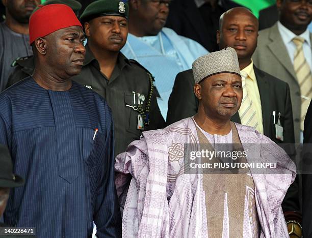 Nigeria's Vice President Namadi Sambo and Deputy President of the Senate Ike Ekweremadu stand for the national anthem during the national...