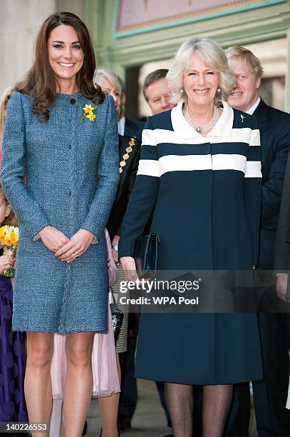 Mayor of London Boris Johnson looks on as Catherine, Duchess of Cambridge and Camilla and Duchess of Cornwall await the unveiling of a plaque...