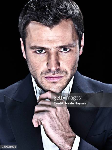 Reality tv personality Mark Wright is photographed for Live, Night & Day magazine on November 1, 2011 in London, England.