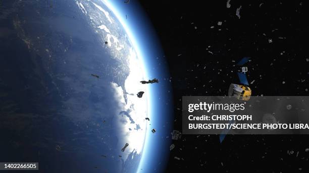 space debris orbiting earth, illustration - orbiting stock pictures, royalty-free photos & images