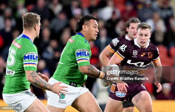 Josh Papalii of the Raiders takes on the defence during the round 14 NRL match between the Brisbane Broncos and the Canberra Raiders at Suncorp...