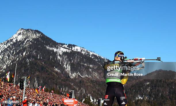 Andreas Birnbacher of Germany to shoots during the IBU Biathlon World Championships Mixed Relay on March 1, 2012 in Ruhpolding, Germany.