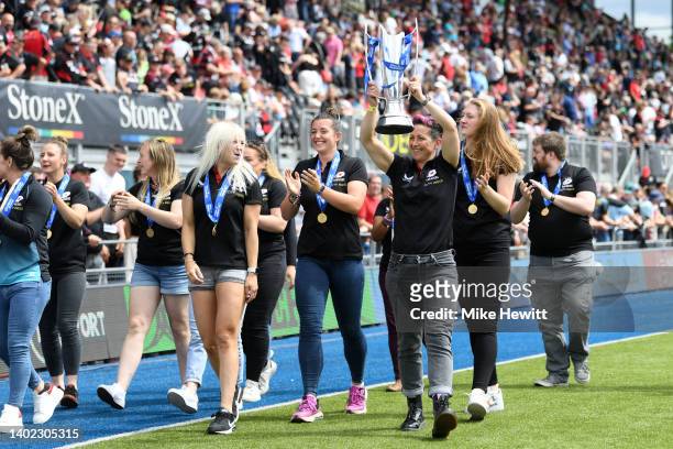 Sonia Green of Saracens shows the Premier 15s trophy to the fans at half-time during the Gallagher Premiership Rugby Semi-Final match between...