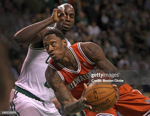 Boston Celtics power forward Kevin Garnett closes the lane as he defends Milwaukee Bucks center Larry Sanders during the first half. Boston Celtics...