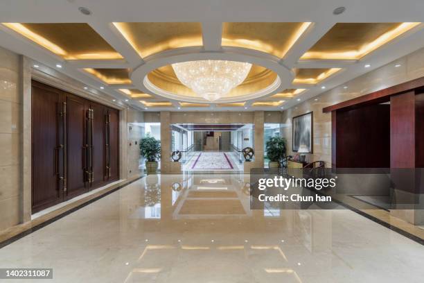 empty and bright hotel lobby - hotel hallway stock pictures, royalty-free photos & images